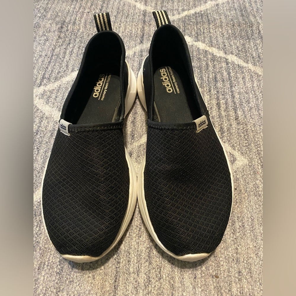 Adidas women’s slip on black and white shoes